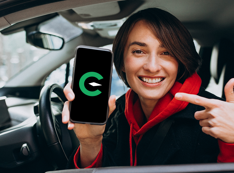 Woman showing Uncar app